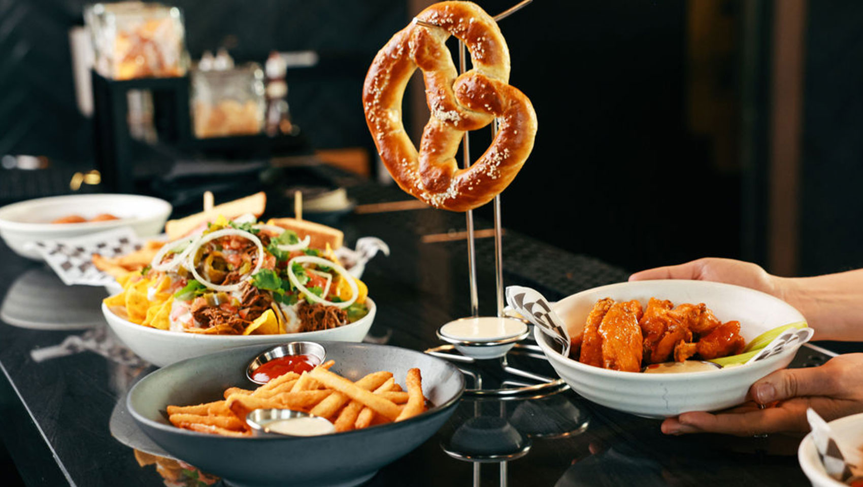 pretzel and appetizers at Good Sport Taproom
