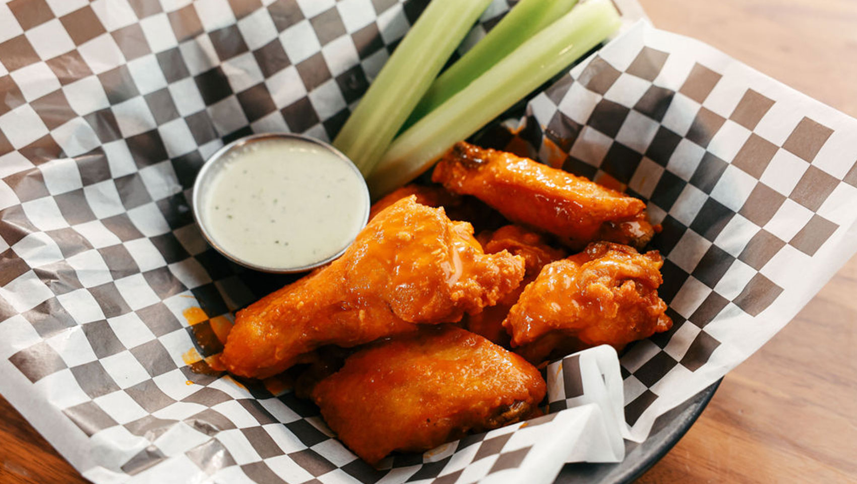 Buffalo wings and celery at The Good Sport