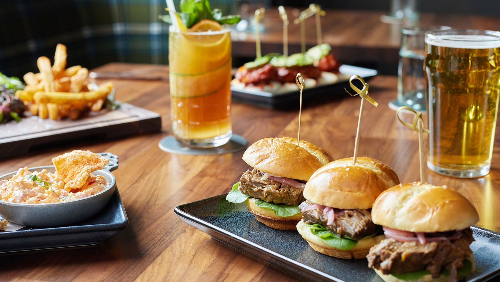 Image of elevated bar food and drinks at The Good Sport in The Forum Hotel