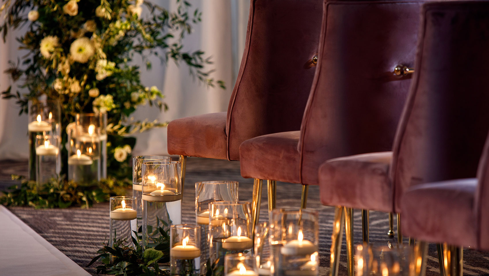wedding aisle with chairs and candles